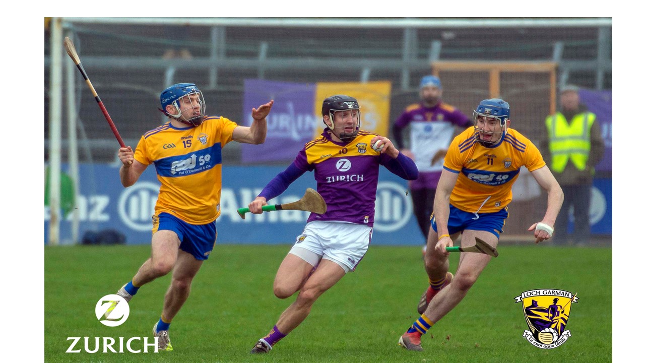 Wides cost hurlers as Clare pull through.  Clare 0-18 Wexford 0-15